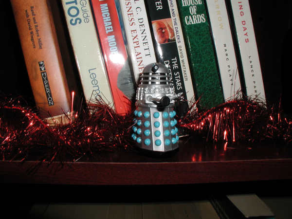 Mr. Dalek on a book shelf
