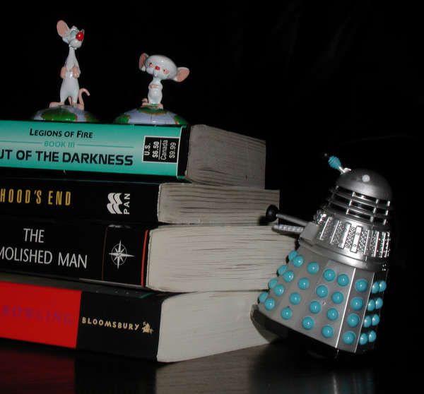 Pinky and The Brain wait for Mr Dalek to follow them up some books.